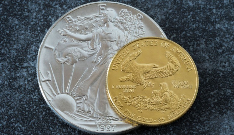 one ounce silver eagle and half ounce gold eagle coin