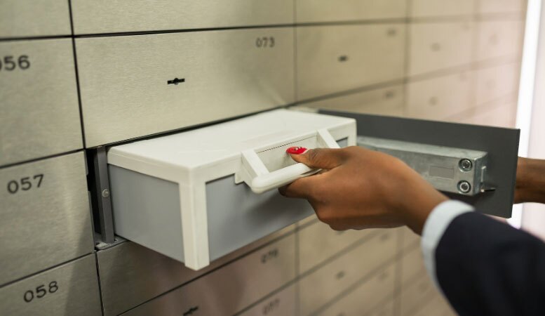 taking out safety deposit box in depository