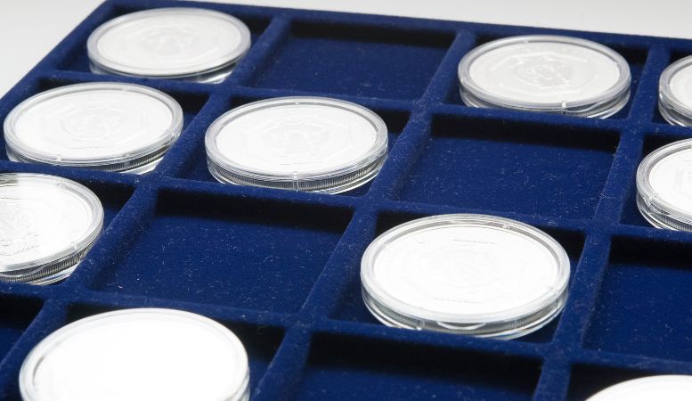 coin tray with uncirculated silver quarters