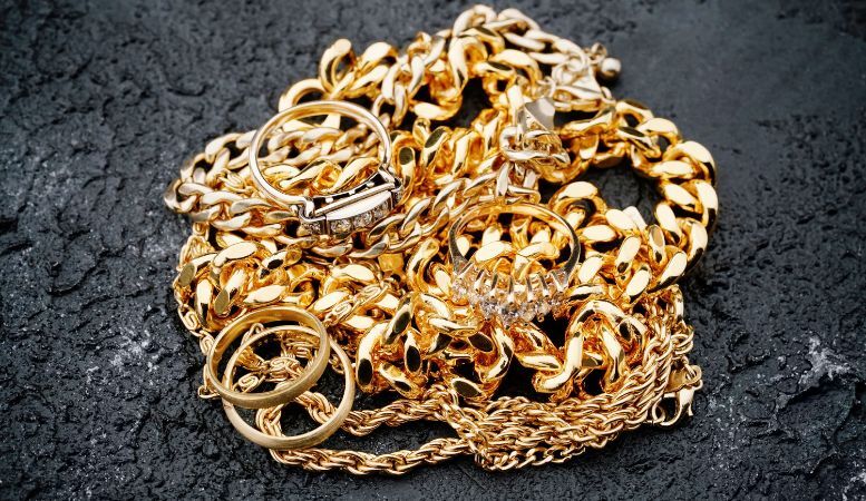 pile of different gold jewelries