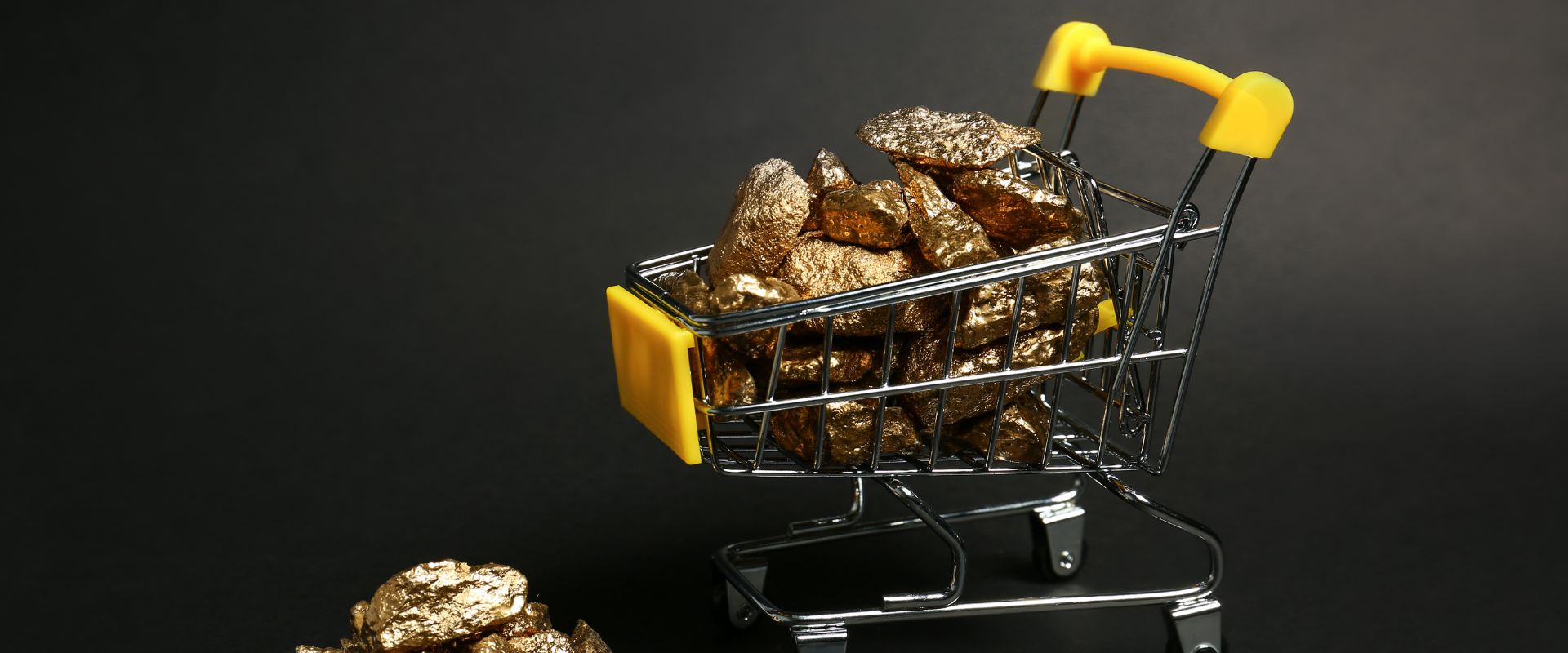 small shopping cart with gold nuggets